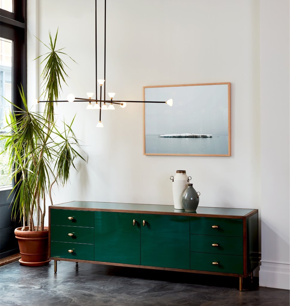 Chandelier - 12 Lights (Matte black/Brushed brass) — Roll & Hill Showroom, New York City. Image by Joseph De Leo