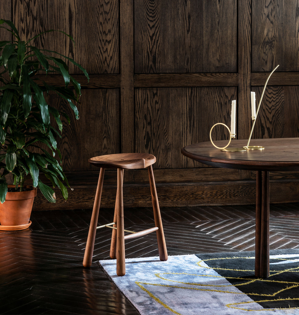 Taper Counter Stool (Black walnut) — Roll & Hill Showroom, New York City. Image by Max Burkhalter